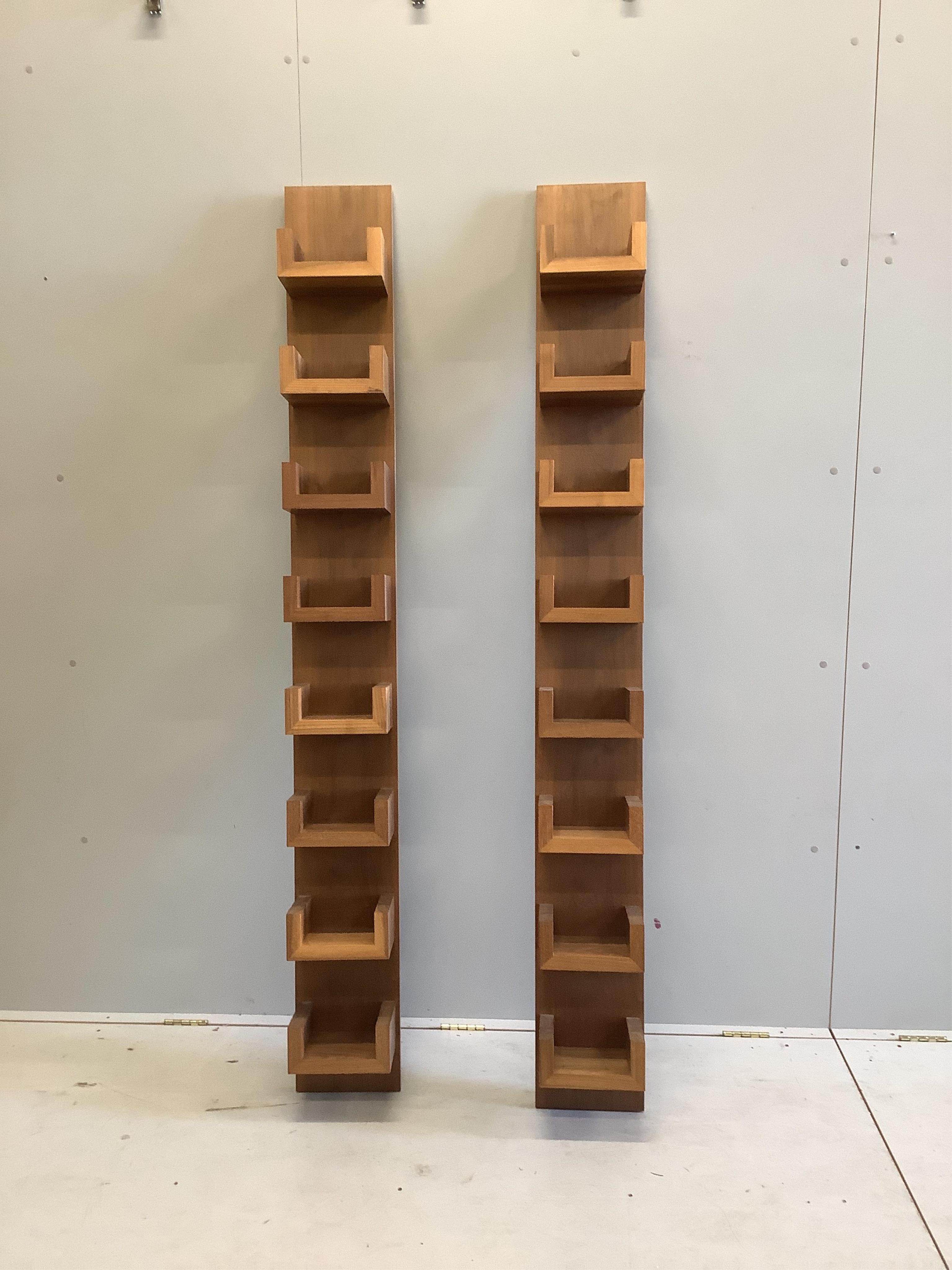 DFP, two solid walnut DVD / book shelving units, width 23cm, depth 18cm, height 194cm. Condition - good